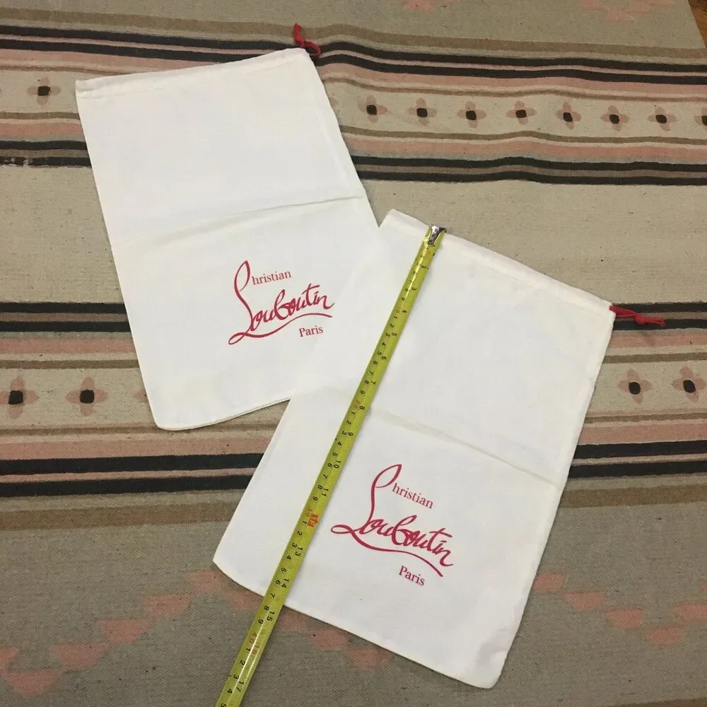 Two (2) Christian Louboutin Paris white w/ red letters & drawstring Dustbag